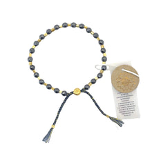 Load image into Gallery viewer, smr // hematite metallic black with yellow gold // Signature Collection bracelet
