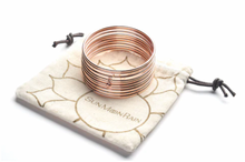 Load image into Gallery viewer, Rose Gold bangles with a Hematite bead(set of 10)
